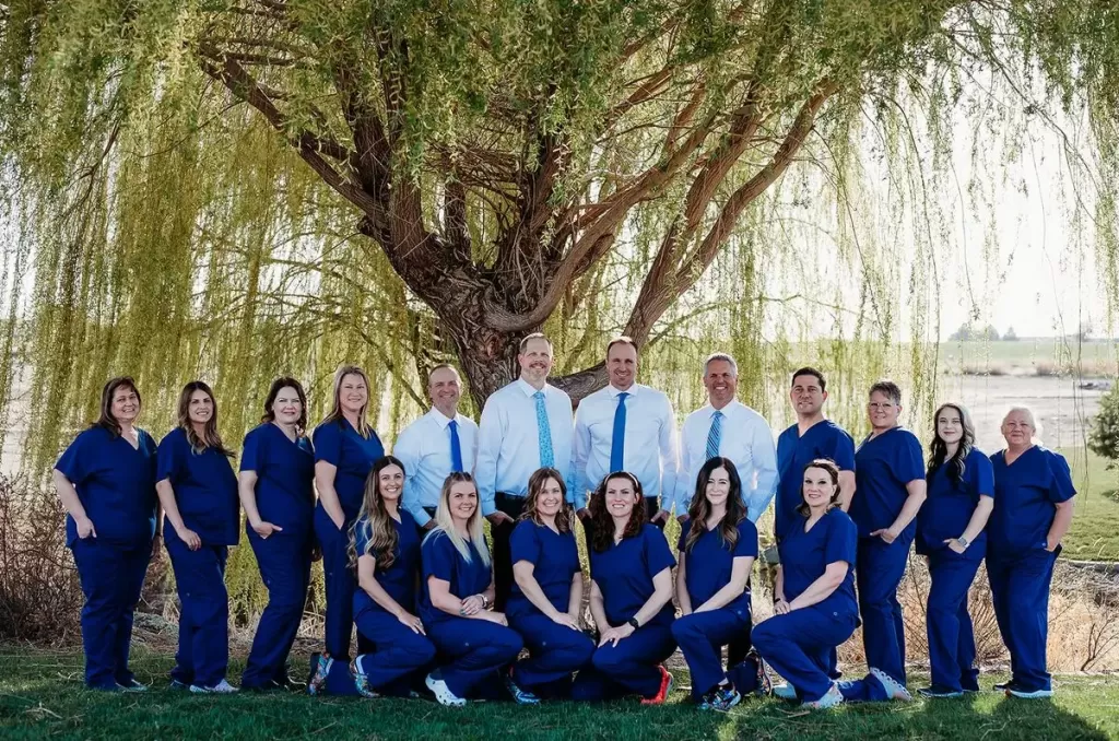 Paramount Surgical Center in Twin Falls staff in front of the river. An outpatient surgery center servicing urology, podiatry, ENT and oral surgical related surgery.